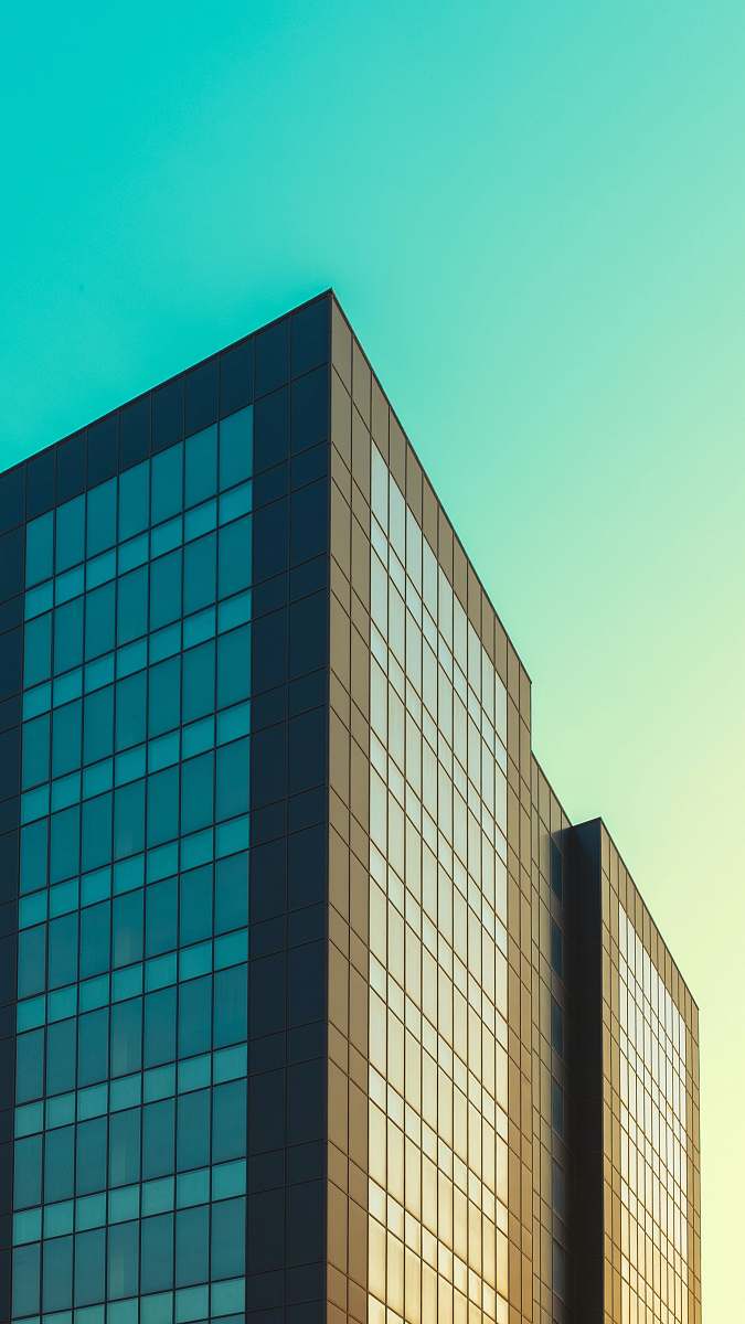 office building blue and white concrete building corner